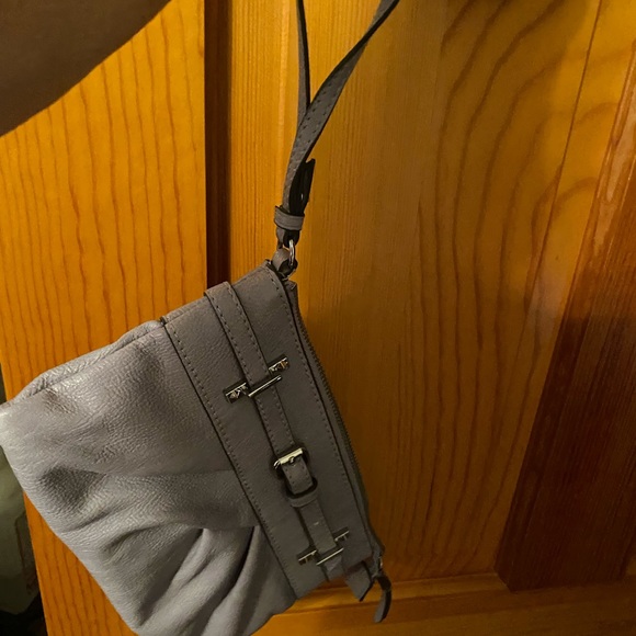 Vera Wang Handbags - Vera Wang lilac wristlet. Soft and like new. Wrist strap is longer than most,